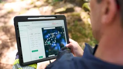 Christoph Vieregge, Portfolio manager and expert for fire alarm systems at Bosch Energy and Building Solutions, with tablet