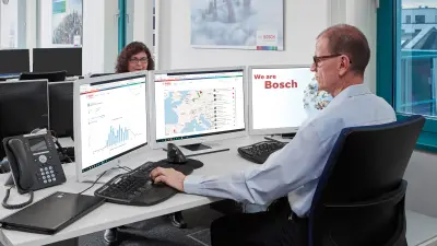 Bosch emergency call and service control center, employee at working station