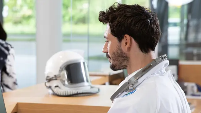 Datanaut working on a laptop as visualization of the rapid access to building data with API Federation Services