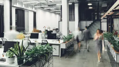 Employees walking around an office