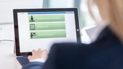 Visitor self-registration at a terminal in the reception area of Bosch customer BABOR