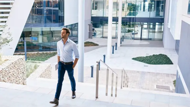 Man i front of a building