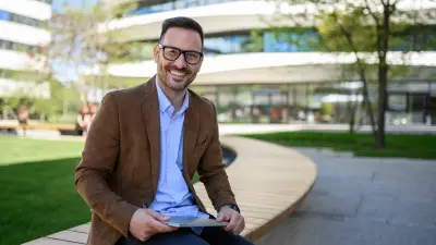 A Facility Manager in front of an re-furbished Commercial Building
