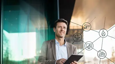 Facility Manager In front of his Building