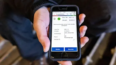 Roland Simion shows the message on his smartphone that the detector has triggered.