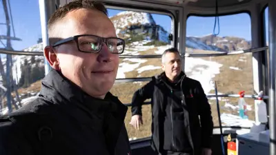 Bosch associates Michel Huger (left) and Roland Simion in a gondola of the Oberstdorf Fellhorn cable car