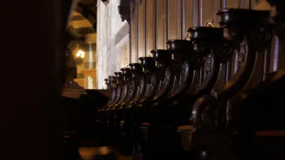 Wooden benches in the choir hall of Aachen Cathedral