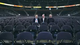 Interior photo of the Arena with Bosch and Arena employees