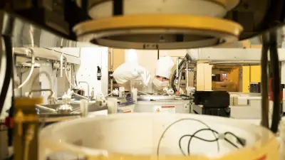 Employee at work in the cleanroom