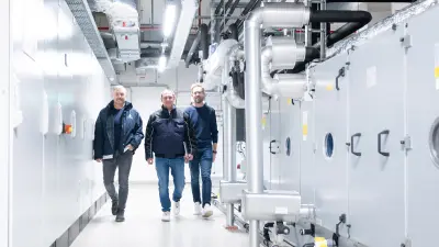 Markus Steurer and Florian Thunitgut from Hörburger with Oliver Walzer from Vetter Pharma, inspecting building automation systems