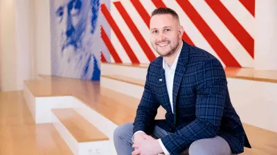 Marius Kaiser siting on stairs