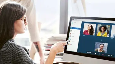 Two employees in a a videoconference