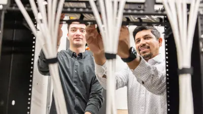 Cabling by two Paladin employees