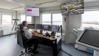 Control room at Scheveningen Harbor, interior view with Harbor Master and screens
