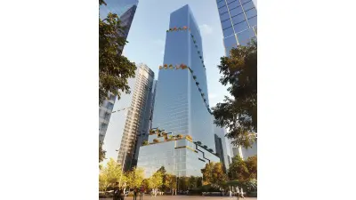 Street view of the skyscraper surrounded by four other skyscrapers