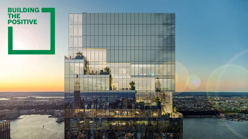 New York skyline reflected in facade of skyscraper “The Spiral”