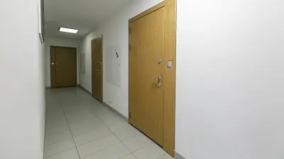 Corridor in apartment building with closed doors