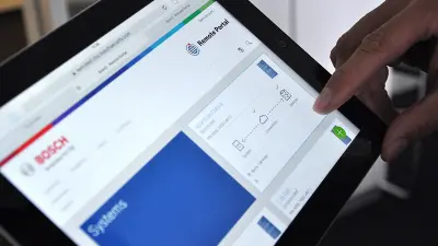 An iPad displaying Bosch's Remote Portal interface.