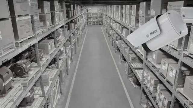 iBOSCH AVIOTEC camera points at warehouse corridor with the lights off