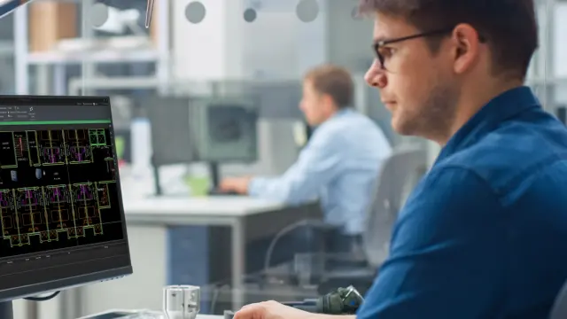 Computer screen with building plan and blinking lights