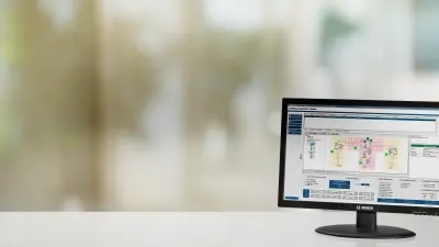 Header image man with computer screens